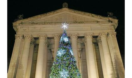 Adoptive family to  help light state Christmas tree