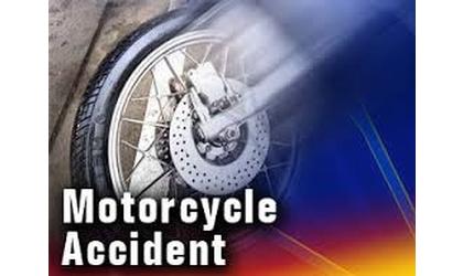 Man remains hospitalized after motorcycle accident