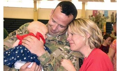 Returning soldiers meet their babies