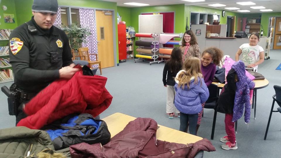 Tonkawa Police, donor, provide coats to children