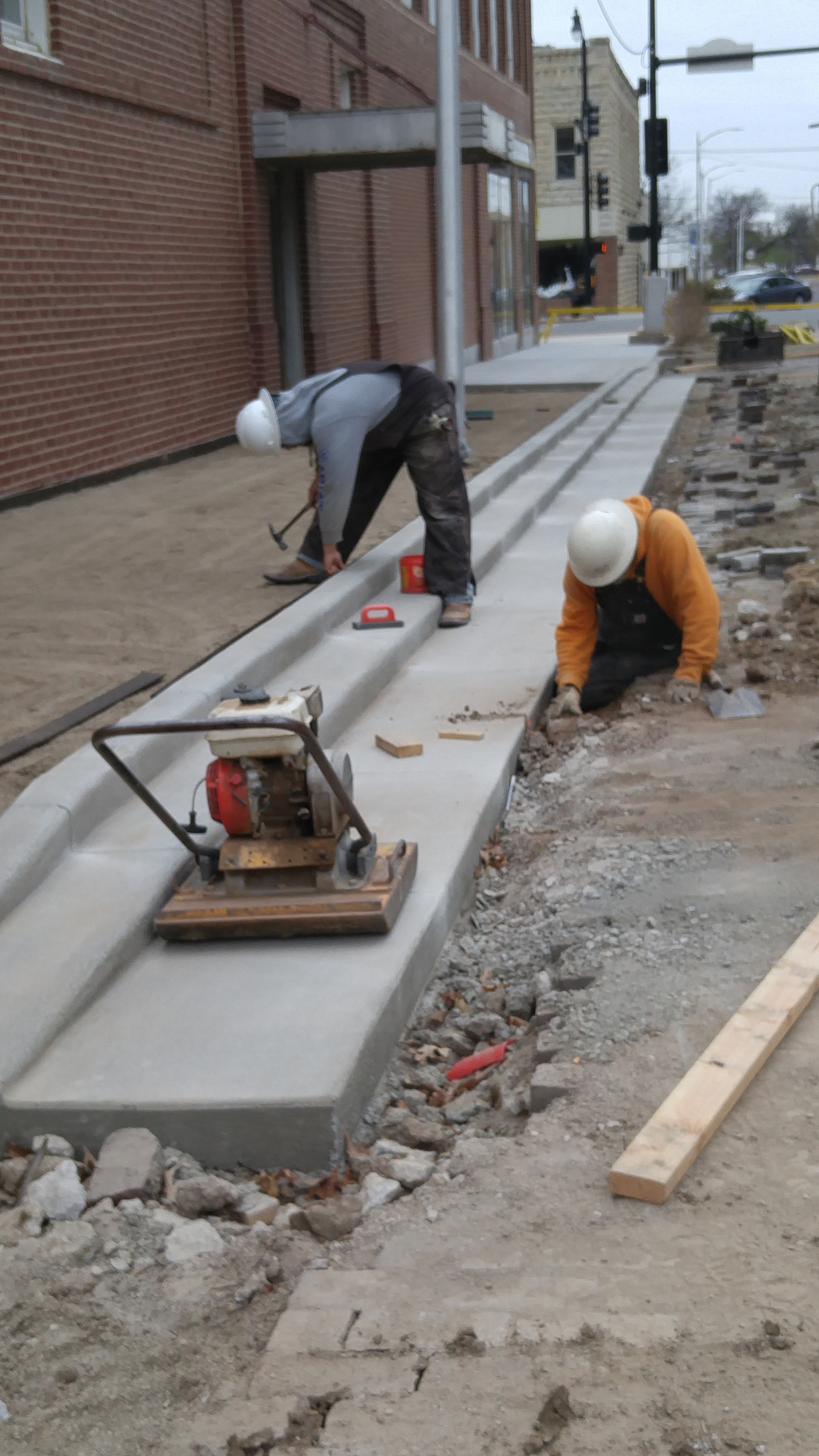 Sidewalk construction continues
