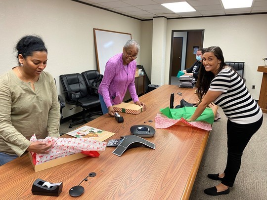Santa Claus Commission Gifts Being Delivered by OJA Staff to Youth in Agency Custody
