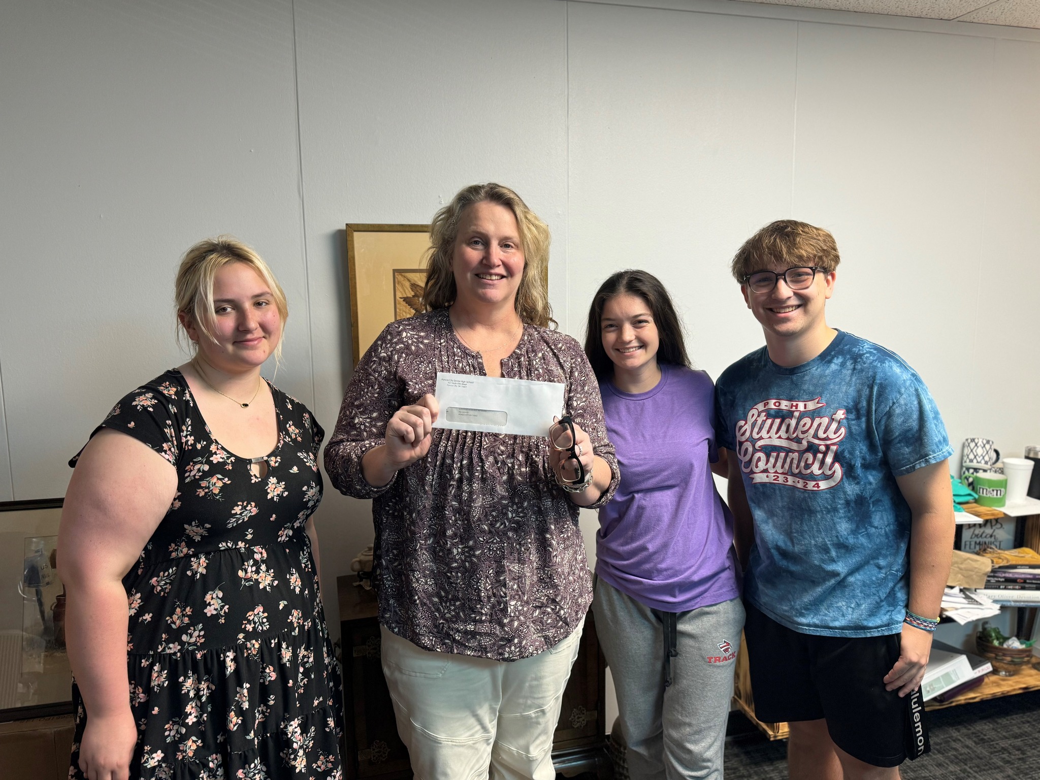 Funds Raised Through W.I.L.D. Week Project At PCPS Donated to Survivor Resource Network