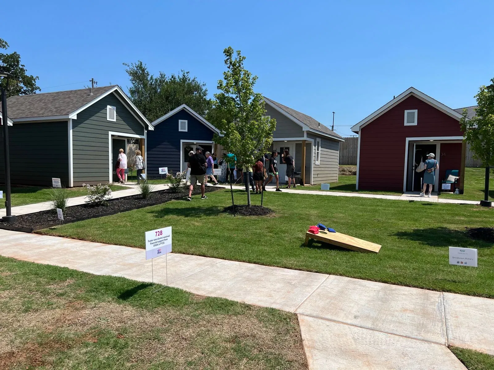 Something That is Their Own’: 15 New Tiny Homes Unveiled for Those Leaving Foster Care